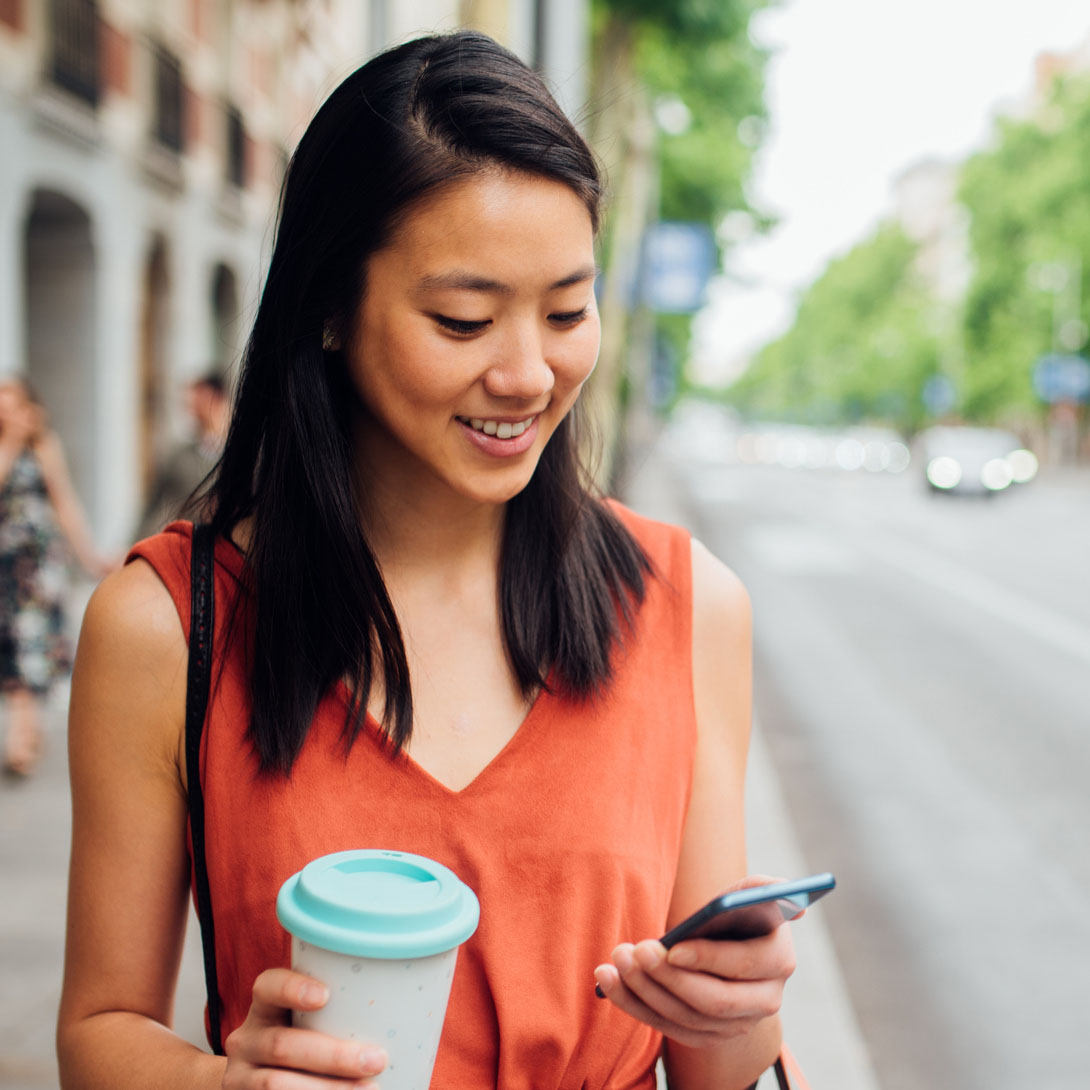 Woman using proactive messaging to launch email, video, and social campaigns